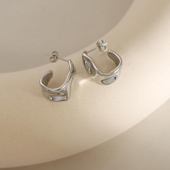 Load image into Gallery viewer, Silver Molten Curve Earrings
